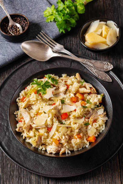 istock Chicken Fried Rice with vegetables in black bowl 1796693420