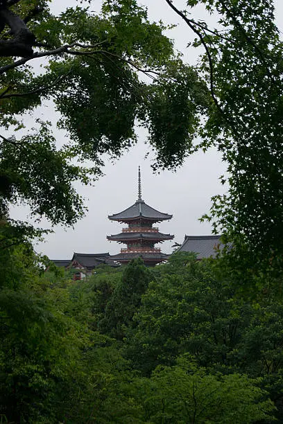 Pagoda in between the trees near Kiyomizu-dera temple. 
