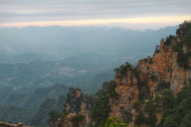istock Serenity in Nature_Vast Green Mountains under China's Blue Sky 1796718029