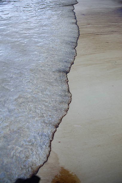 istock Gulf oil spill is shown on a beach 179673295