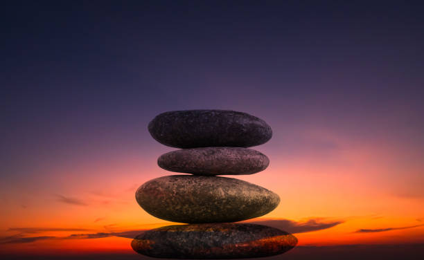 istock Stone Balance Sunset Background Tower Pebble on Rock Stack Perfect Pile Scene Free Space Sunrise Concept Peace Relax Nature Harmony Broken Heart, Pyramid Zen Garden Japan Table Meditation Stability 1796740557