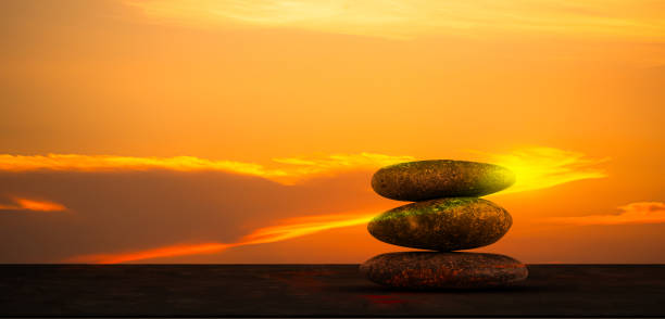 istock Stone Balance Sunset Background Tower Pebble on Rock Stack Perfect Pile Scene Free Space Sunrise Concept Peace Relax Nature Harmony Broken Heart, Pyramid Zen Garden Japan Table Meditation Stability 1796741067