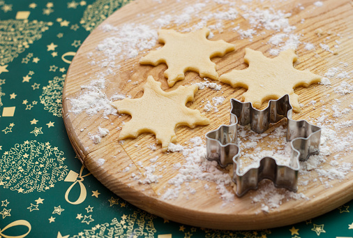 A selection of gingerbread cookies for Christmas. \n- Gingerbread snowflake\n- Gingerbread man\n- Gingerbread heart\n- Gingerbread ornament\n- Gingerbread candy cane\n\nIsolated on white.