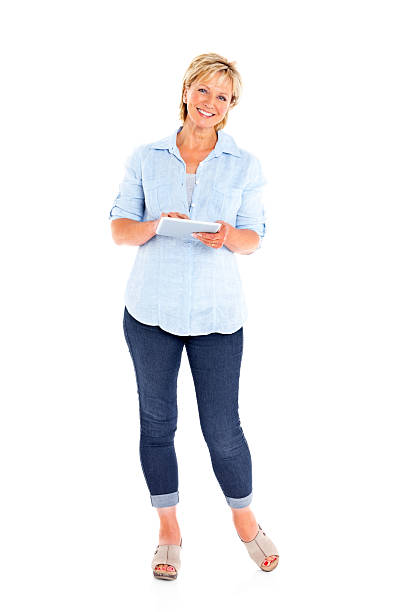 istock Beautiful senior woman with a digital tablet smiling 179674716