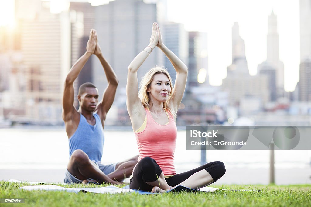 Fitness people relaxing in urban park Activity Stock Photo