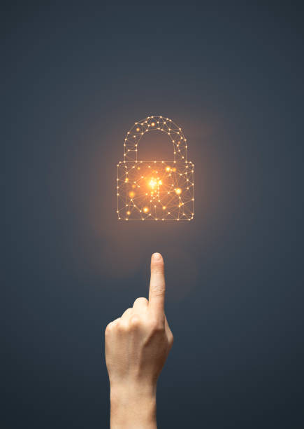 Network Security Artificial intelligence padlock symbol and finger touching it stock photo