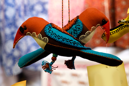 Colourful hanging birds that decorated with colorful handmade clothes, Cloth birds.