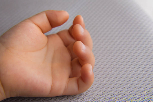 Cute hands of a sleeping child