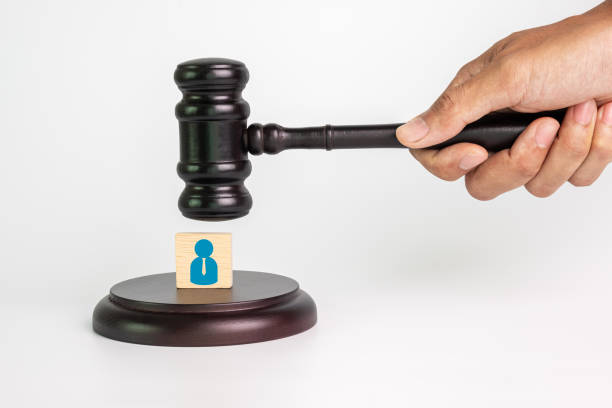 istock Business Judgment Navigating Corporate Decisions and Ethics concept. Lawyer hammer with businessman icon on wooden block. 1796786905