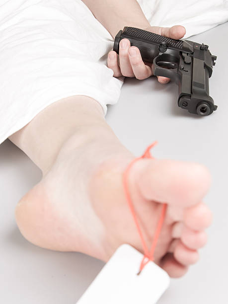 Woman committed suicide, under a sheet with toe tag