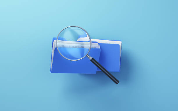 istock Blue Folder and Documents with magnifying glass icon, sitting on Soft Blue background, Research concept 1796803943
