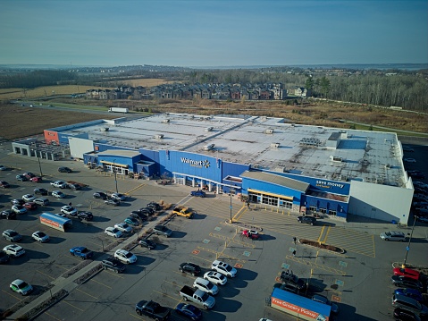 Image is intended for editorial use -  Aerial View of a Wal-Mart Super Store and Parking Lot