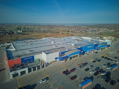 Image is intended for editorial use -  Aerial View of a Wal-Mart Super Store and Parking Lot