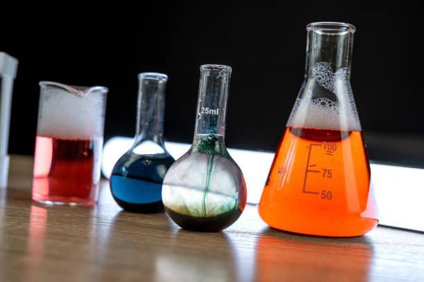 istock Group of laboratory flasks and beaker for experiment with color liquid in science laboratory 1796841372