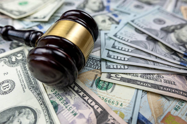 istock US 100 dollars bills with law gavel, legal issues 1796845158