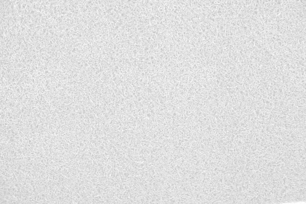 istock White fiber texture from carpet in car, used for bright backgrounds. 1796846231