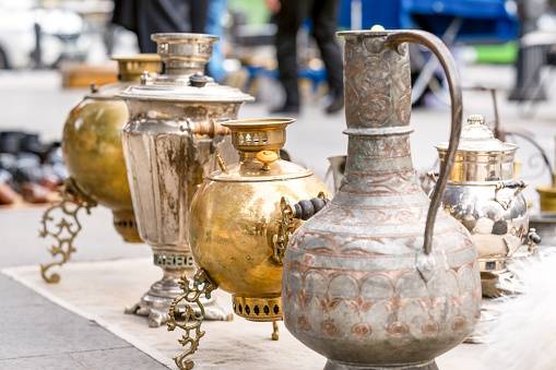 street market in Tbilisi, minted jug and samovars on the ground