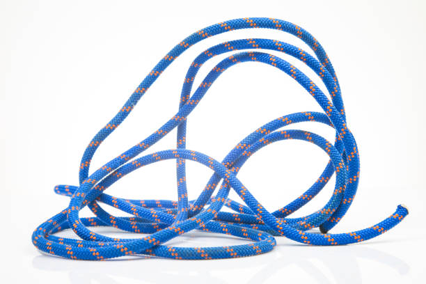 istock durable colored rope for climbing equipment on a white background. climbing rope. coil of braided cable. item for tourism and travel 1796905292