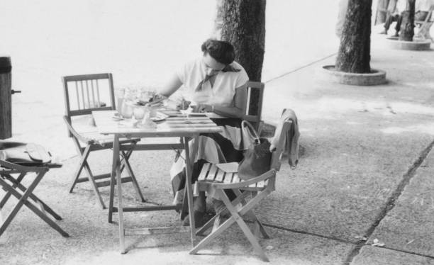 istock Woman writing in 1955. 1796906984