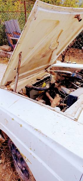 istock Old car, abandoned rusted car 1796917662