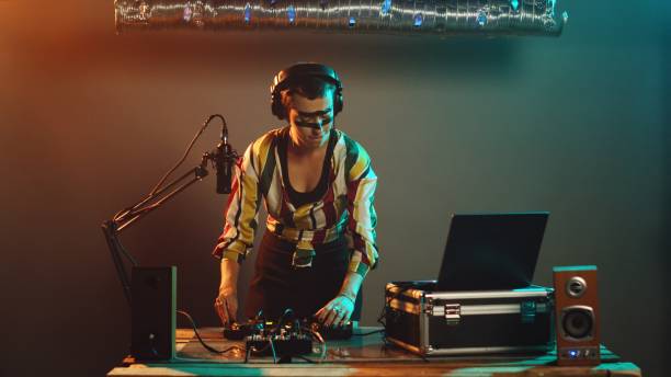 istock Female disc jockey doing prayer hands sign on stage 1796931526