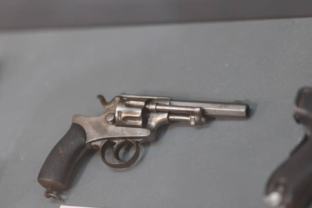 istock A metallic revolver pistol resembling a firearm. 1796933740