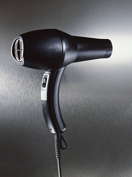 asciugacapelli - hair dryer single object plastic black foto e immagini stock