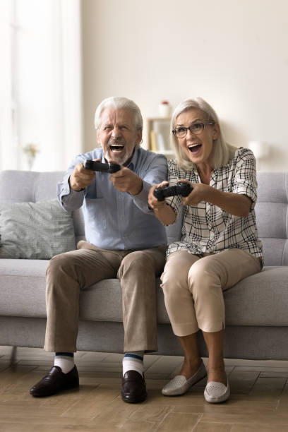 istock Overjoyed elderly husband and wife having fun at home 1796991521