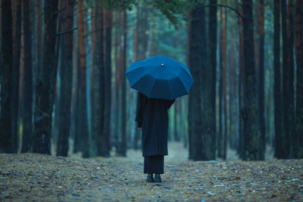 istock Woman with umbrella. Rain. Bad weather. Depression 1796996993