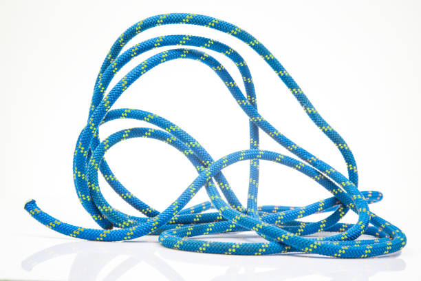 istock durable colored rope for climbing equipment on a white background. climbing rope. coil of braided cable. item for tourism and travel 1797009338