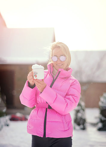 girl in winter with a cup