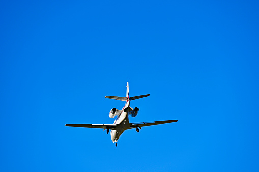 Chantilly, Virginia, USA - November 12, 2023: A private Cessna 560XL Citation XLS jet approaches Washington Dulles International Airport on short final on a sunny Fall afternoon.