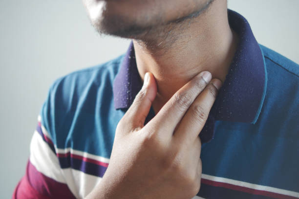 istock unrecognized man suffering throat pain close up 1797051512