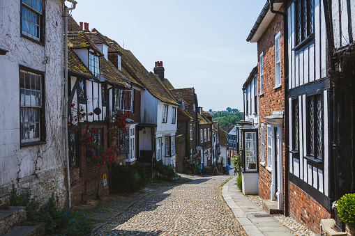 Rye, England - June 13, 2023: High St, Rye, Sussex, England. Tourists walk on the street.