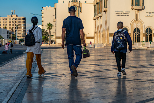 Casablanca, Morocco - Sep. 12 2023: Street view of Rue de Tiznit. People going to work and school in the morning walking on the street, Casablanca, Morocco.