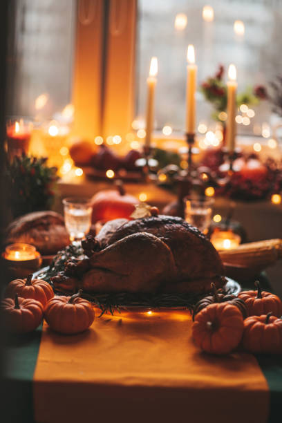istock Thanksgiving holiday dinner table setting with fall decoration and pumpkins 1797074990