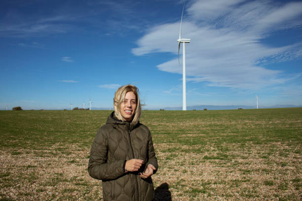 istock Woman in wind farm 1797087459