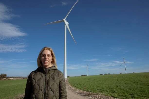 istock Woman in wind farm 1797087461