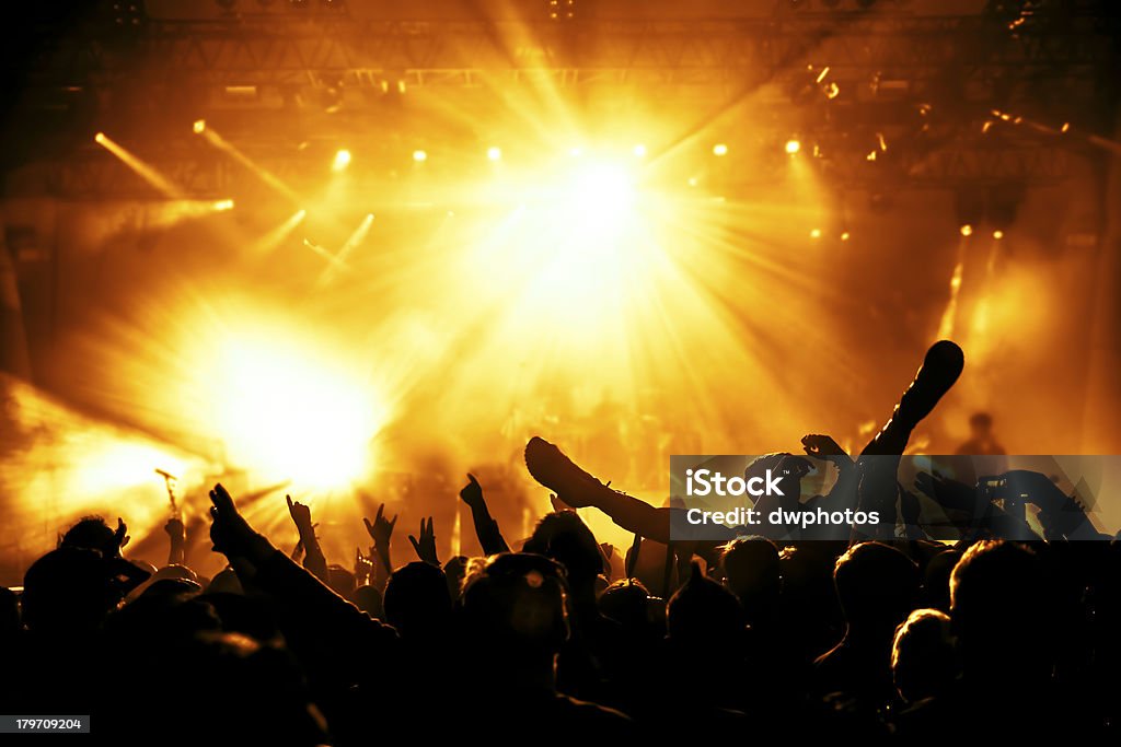 Concert Crowd Silhouettes of crowd at a rock concert Crowd Surfing Stock Photo