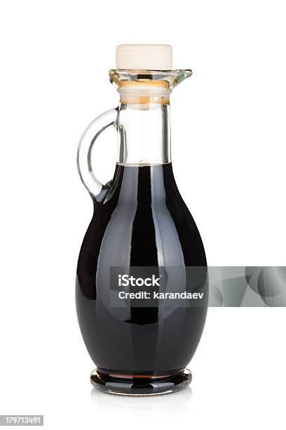 Glass Bottle With Handle Full Of Black Liquid Stock Photo - Download Image Now - Balsamic Vinegar, Vinegar, Cut Out