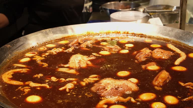 A serving of rice with traditional Thai style slow-cooked stewed meat in a restaurant in a shopping mall in Bangkok, Thailand.