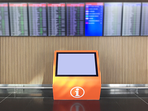 Information kiosk digital display with arrival and departure boards in airport. Empty information kiosk with clipping path. Arrival and departure boards on device screens
