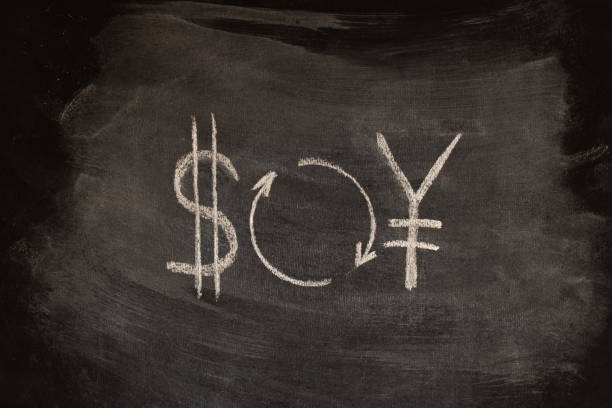 istock Currency exchange, chalk drawing on blackboard, yuan and dollar exchange. 1797176169
