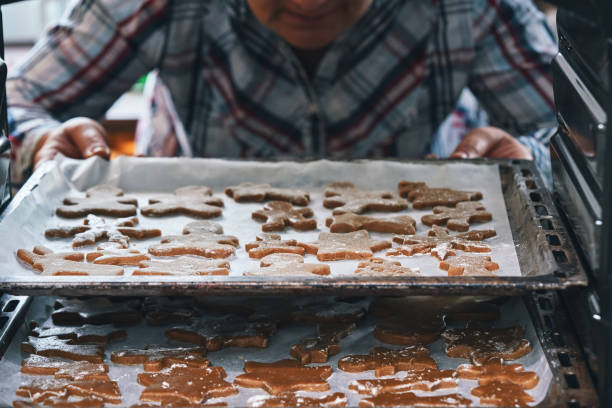 Baking Gingerbread Christmas Cookies in Domestic Kitchen