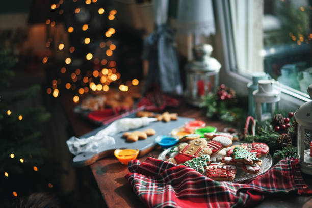 istock Decorating Gingerbread Christmas Cookies with Icing 1797200234