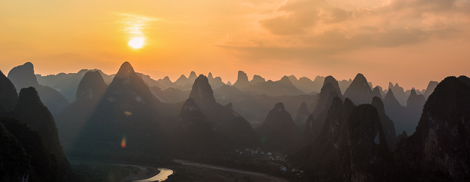 Panoramic landscape sunset scene view from Laozhai mountain on the karsten hills in Guilin, Guangxi,China