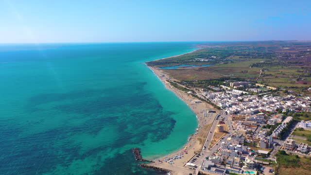 Aerial View of Paradise Beach with Turquoise Sea in City of Puglia, Italy