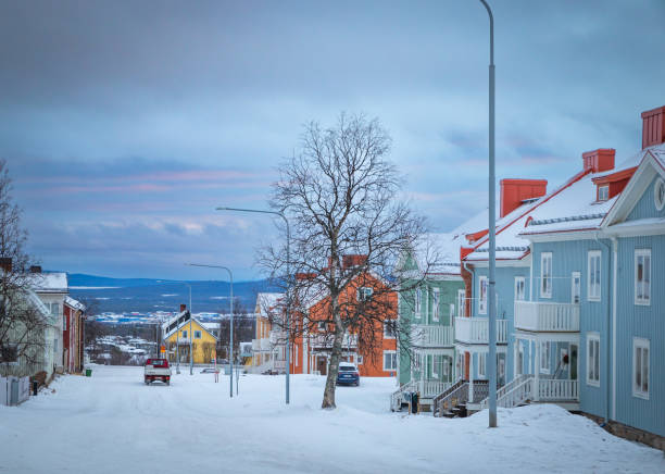 fairy tale town in Kiruna, Sweden, colorful house, snow-covered street fairy tale in Kiruna, Sweden, colorful house, snow-covered street norrbotten province stock pictures, royalty-free photos & images