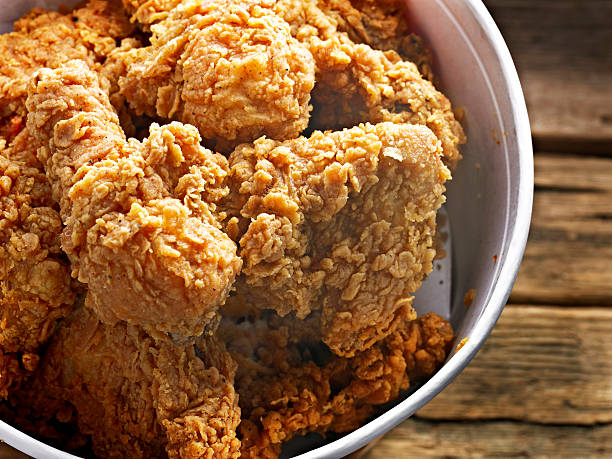 Fried Chicken Fried Chicken in a bucket. fried chicken stock pictures, royalty-free photos & images
