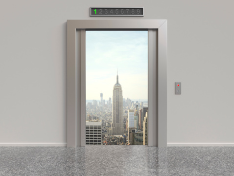 elevator with opened doors to city